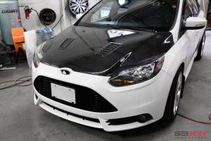 Seibon - 2012-2013 Ford Focus Seibon Carbon Fiber Hood - RS Style - Image 8